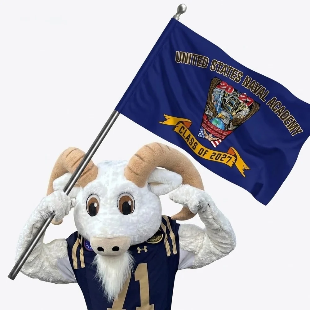 Bill the Goat holding the Class of 2027 crest flag